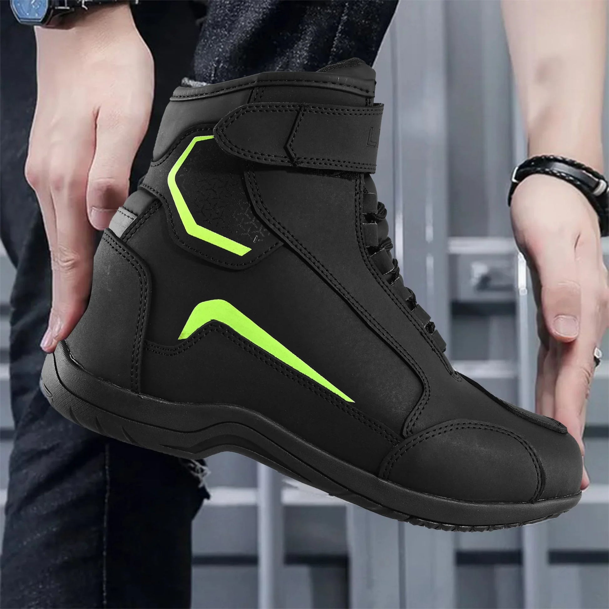 Black motorcycle riding boot with neon yellow accents, modern design, ankle protection